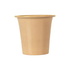 Beige ceramic tea strainer with gold rim on a white background